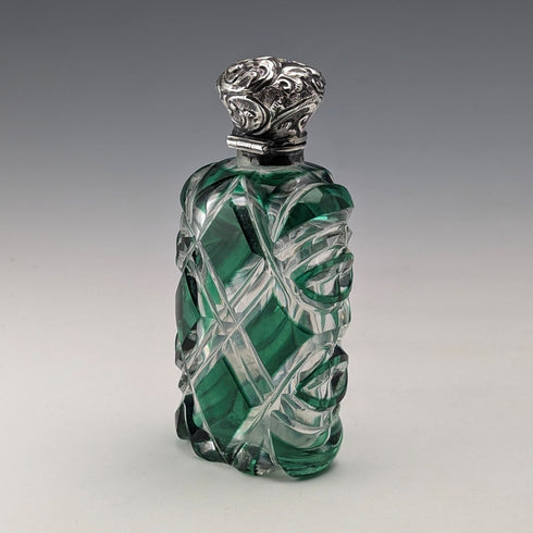 Antique British silver-lidded green cut glass portable perfume bottle